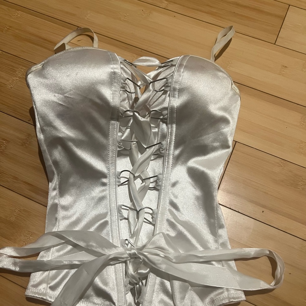Costume satiny white corset.